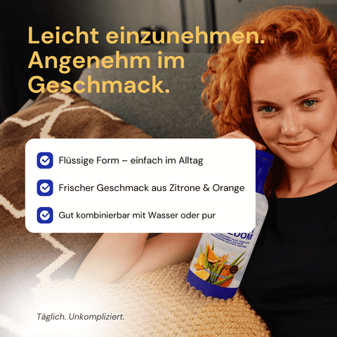 Frau mit Forever Freedom Flasche – flüssiges Nahrungsergänzungsmittel mit Aloe Vera